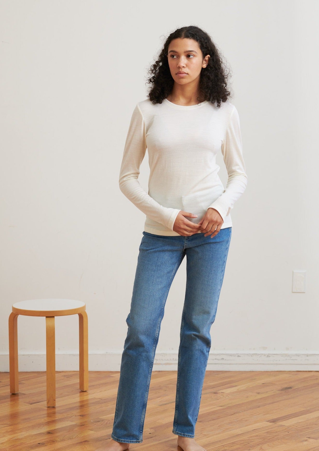 A classic long-sleeve crew neck, this layering piece in ethical wool is soft and lightweight and designed to wear all seasons.