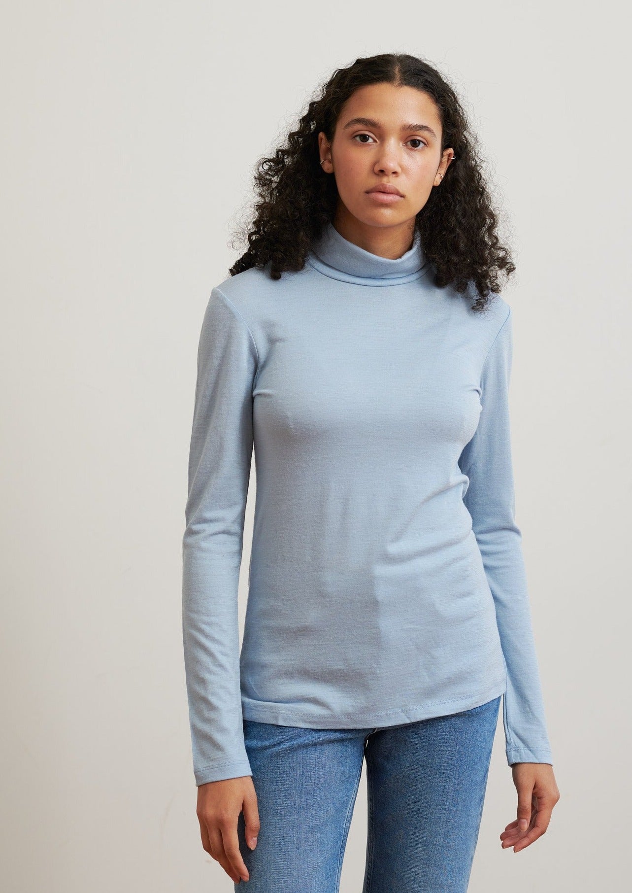 A timeless turtleneck, this layering piece in ethical merino wool is soft and breathable and designed for comfort and versatility in your everyday life.